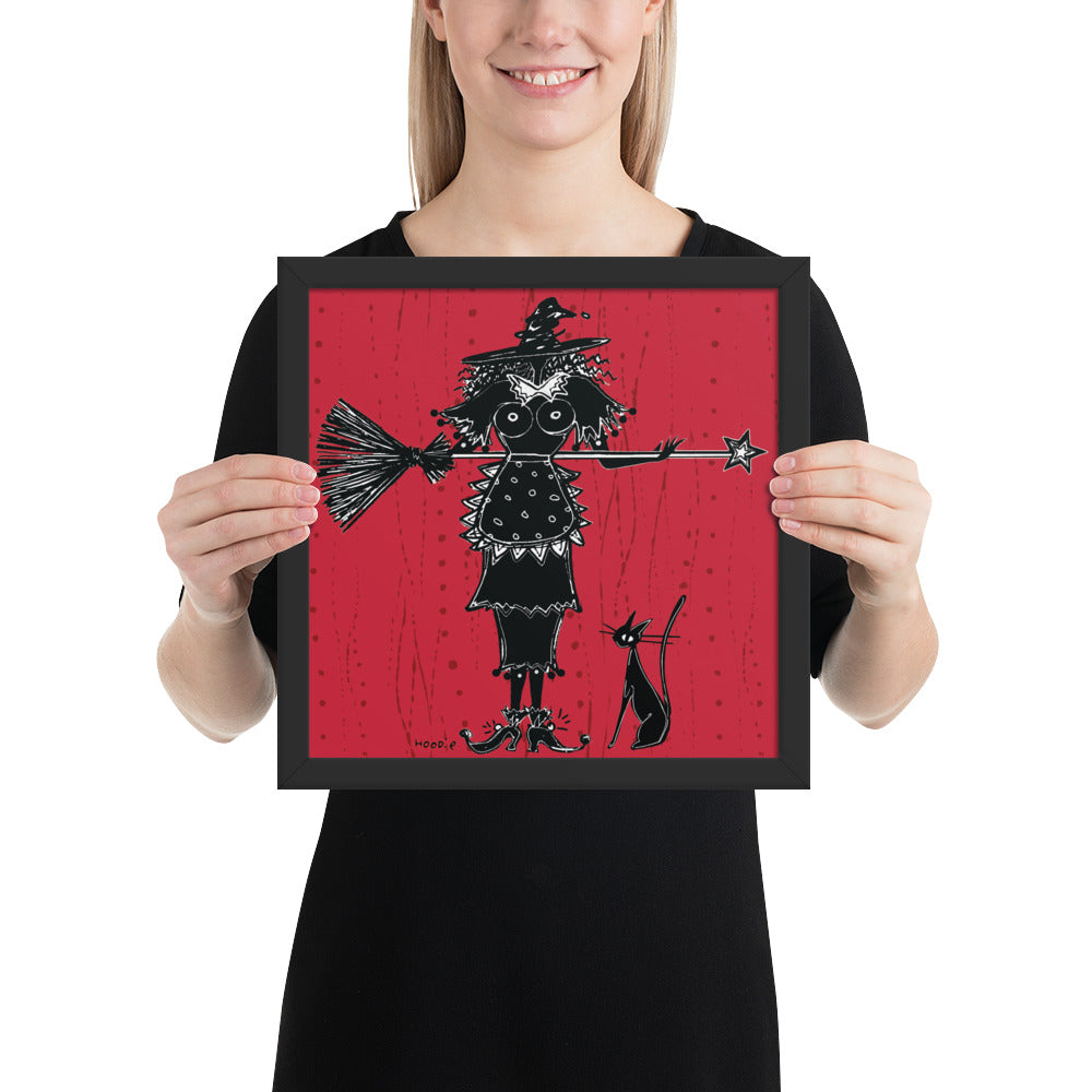 A witch holds a broom