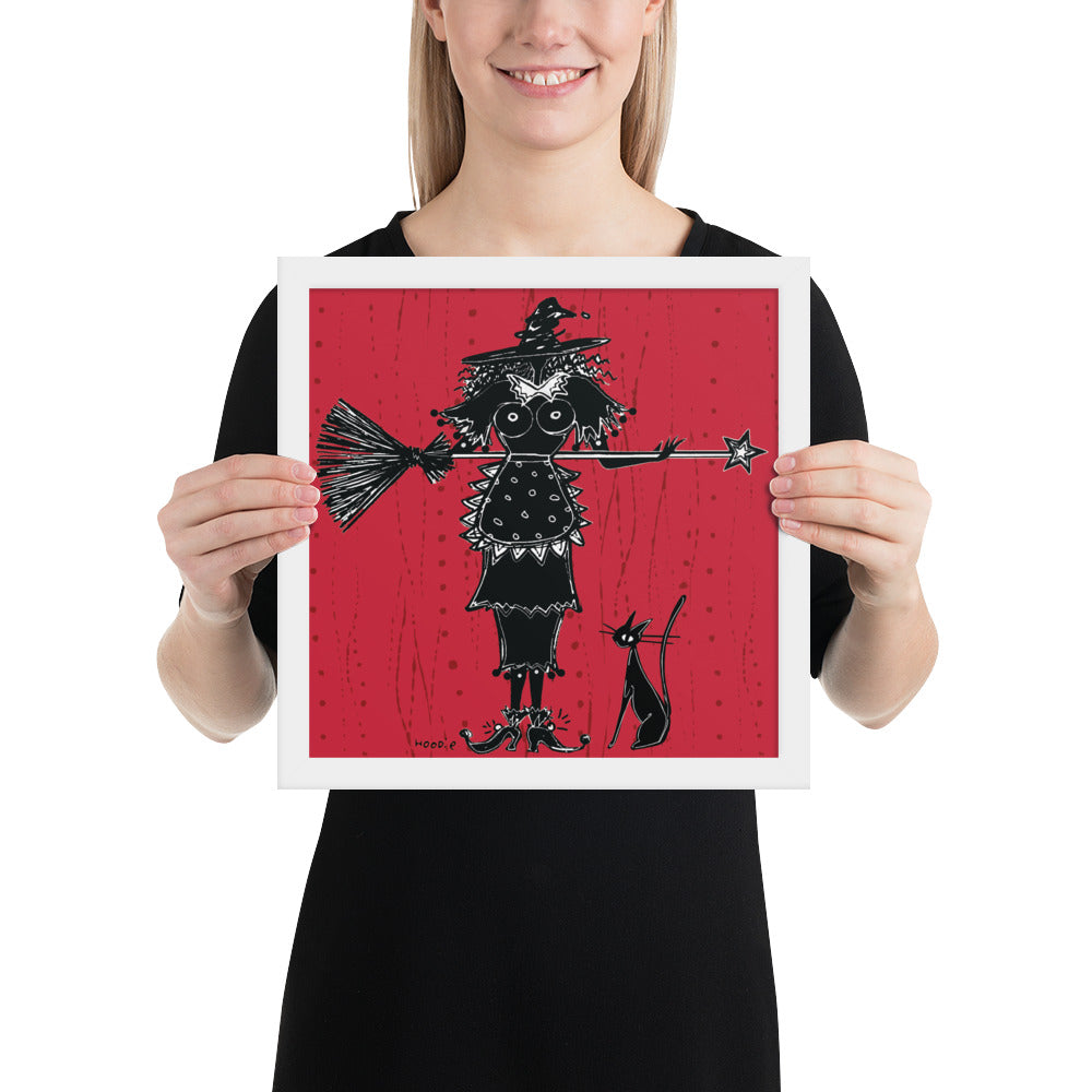 A witch holds a broom